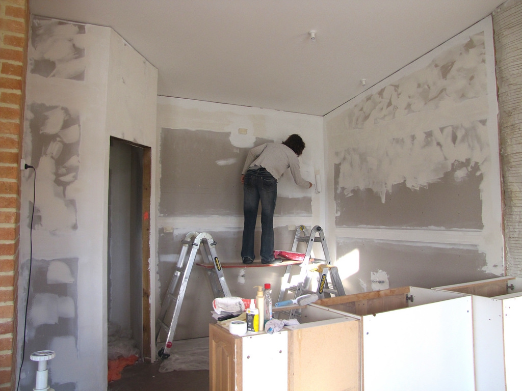 Person using plasterboard in home DIY project